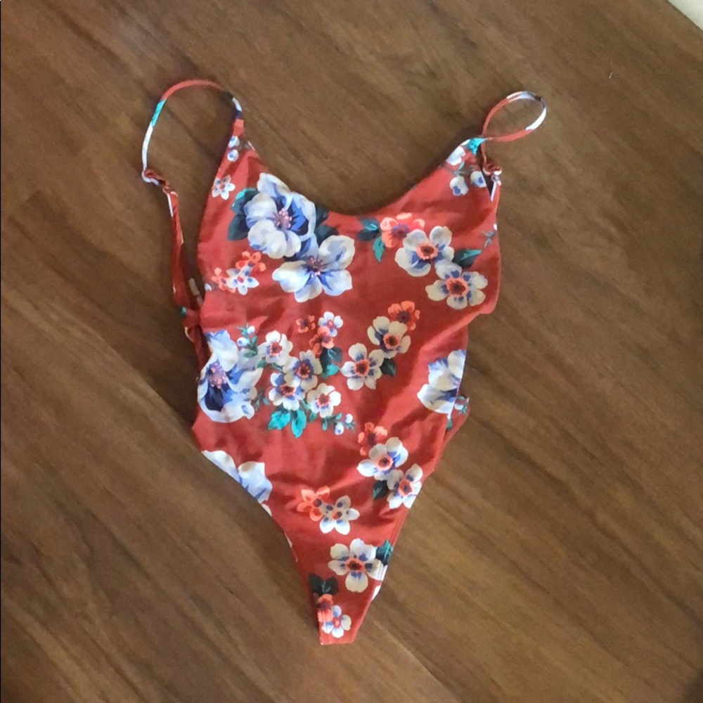 One piece swim. With cutout on the sides